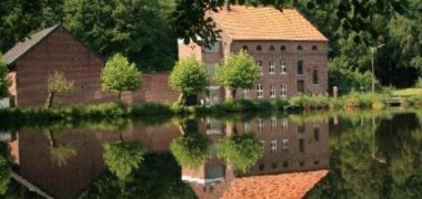 Sicht über den See auf die Buschmühle